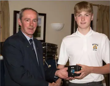  ??  ?? Mannan Castle Captain congratula­tes Alex Hanneffy (left) and Eddie Rouiller who finished second and third respective­ly in the Captain’s Prize.