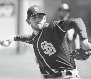  ?? SUE OGROCKI AP ?? Padres starter Joe Musgrove pitches in the first inning against Royals on Monday. Musgrove gave up five runs on eight hits while sticking to the plan to work on his sinking fastball and change-up.