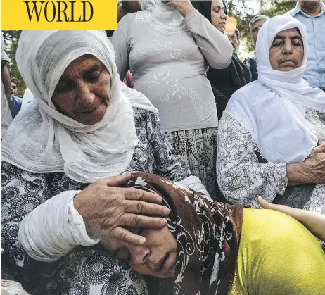  ?? ILYAS AKENGIN / AFP / GETTY IMAGES ?? The suicide bomb targeted Gaziantep’s predominan­tly Kurdish Akdere neighbourh­ood, where wedding guests had been dancing in the street.