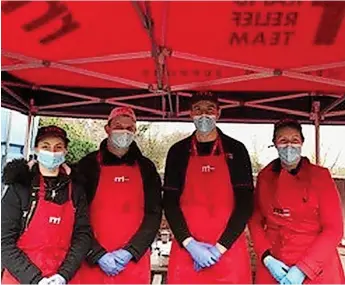  ?? ?? The Rapid Relief team provided hot food and drinks for those enjoying the festive party held at Steps children’s charity in Shepshed, where Santa also popped in