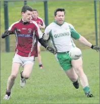  ??  ?? Shane Wall from Baltinglas­s and Alan Norton of Stratford compete in this Division 2 clash. Pic: Joe Byrne.