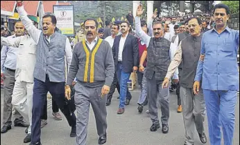  ?? DEEPAK SANSTA/HT ?? State Congress president Sukhvinder Singh Sukhu (third from right) and other Congress legislator­s coming out the Vidhan Sabha in Shimla on Friday.