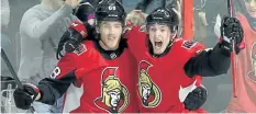  ?? FRED CHARTRAND/THE CANADIAN PRESS ?? Ottawa Senators’ Matt Duchene celebrates his game-winning overtime goal against the San Jose Sharks with teammate Mike Hoffman during overtime NHL hockey, in Ottawa, on Friday, Jan. 5.