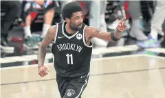  ?? USA TODAY SPORTS ?? The Nets’ Kyrie Irving gestures during a game last season.