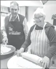  ?? Photo Submitted ?? Former District 24 Rep. Phil Mueller and his wife, Darlene, bake lefse for the annual Dem-NPL Roundup to be held this Sunday Dec. 4 evening at Dacotah Pavilion in Chautauqua Park. Doors open at 4:30, and catered meal is at 5:30. The Muellers’ homemade Norwegian favorite has long been a popular feature of the annual Roundup.