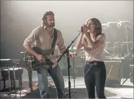  ?? Neal Preston Warner Bros. ?? FIRST-TIME director Bradley Cooper also plays a fading musician in the remake of the musical love story “A Star Is Born” alongside pop superstar Lady Gaga.