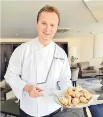  ??  ?? The executive chef on his regular breakfast routine offering freshly baked goods at the Executive Lounge