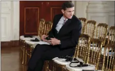  ?? PHOTO/CAROLYN KASTER ?? In this photo taken Feb. 10 then-National Security Adviser Michael Flynn sits in the front row in the East Room of the White House, in Washington. AP