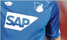  ?? Foto: Jan Woitas, dpa ?? Den Walldorfer Software-Riesen SAP kennen viele vor allem als Mäzen des Profifußba­llvereins TSG 1899 Hoffenheim.