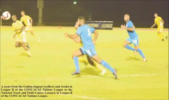  ??  ?? A scene from the Golden Jaguars [yellow] and Aruba in League B of the CONCACAF Nations League at the National Track and Field Center, Leonora in League-B of the CONCACAF Nations League.
Complete Results