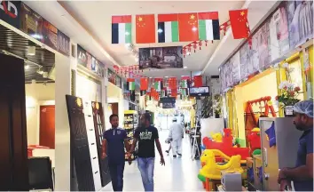  ?? Abdul Rahman/Gulf News ?? The national flags of the UAE and China hanging in the AD Mart, also known as the ‘China Market’, in Musaffah Industrial Area in Abu Dhabi yesterday.