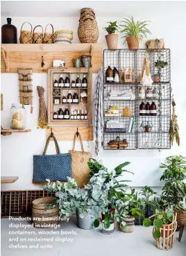  ??  ?? Products are beautifull­y displayed in vintage containers, wooden bowls, and on reclaimed display shelves and units