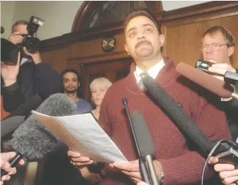  ?? DIANA NETHERCOTT/FILES ?? Harry Lali announces his resignatio­n from the NDP cabinet, where he served as transporta­tion minister, in 2001. Now with B.C. United, the 67-year-old says he doesn't plan to return to elected office.