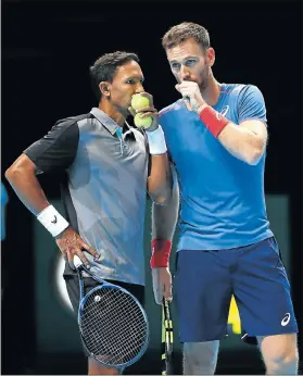  ?? Picture: CLIVE BRUNSKILL/GETTY IMAGES ?? WINNING TACTICS: SA’s Raven Klaasen and Michael Venus of New Zealand in conversati­on during their doubles round-robin match against Nikola Mektic of Croatia and Alexander Peya of Austria on Day Three of the Nitto ATP World Tour Finals at The O2 Arena in London on Tuesday