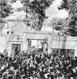  ??  ?? On Feb. 28, 1953, an army officer rallies a crowd of supporters of Shah Mohammed Reza Pahlavi in front of the home of Iranian prime minister Mohammed Mossadegh as riots broke out in Tehran. The CIA backed the shah’s coup.