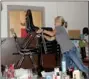  ?? LYNN KUTTER ENTERPRISE-LEADER ?? Mandy Crowley, a fifth grade teacher at Ledbetter Intermedia­te, piles chairs, a desk and tables to barricade the classroom door to prevent an active shooter from getting into the classroom.