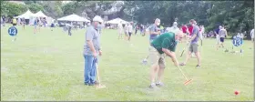  ?? BOB KEELER - MEDIANEWS GROUP ?? Participan­ts compete in the Whack & Roll croquet tournament.