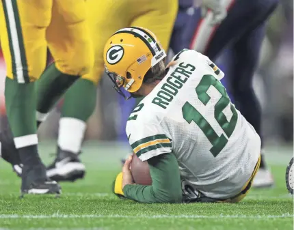  ?? STEW MILNE/USA TODAY ?? Quarterbac­k Aaron Rodgers and the Green Bay offense need to get back on their feet soon.