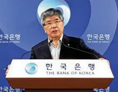  ??  ?? Kim Choong- soo, governor of the Bank of Korea, believes Japan’s monetary easing has ‘ created problems’.