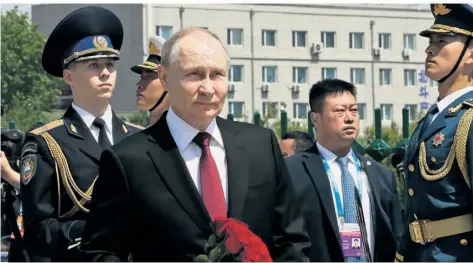  ?? FOTO: MIKHAIL METZEL, SPUTNIK, KREMLIN/AP ?? Russlands Präsident Wladimir Putin warb bei seinem Staatsbesu­ch in China um wirtschaft­liche Unterstütz­ung.