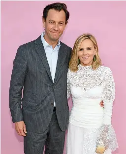  ??  ?? Power Couple “Having [Roussel] during this crisis was a godsend for me personally and for our company as well,” Burch says of her husband, who joined Tory Burch LLC as CEO in January 2019, shortly after their wedding.