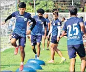  ?? TWITTER ?? East Bengal (left) and Mohun Bagan players train ahead of the new Indian Super League season.