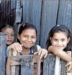  ?? Rick Steves’ Europe/RICK STEVES ?? Taking an educationa­l tour often means you’ll visit a struggling part of the world and engage with the locals — like these schoolchil­dren in El Salvador.