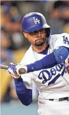  ?? ASHLEY LANDIS/AP ?? The Dodgers’ Mookie Betts bats against the Brewers on Oct. 1, 2021, in Los Angeles.