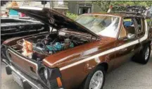  ?? PAUL KIRBY — DAILY FREEMAN ?? A 1976 AMC Gremlin on display at the Fair Street Reformed Church’s sixth annual Classic Car Show on Saturday. Organizer Karl Olsson said the vehicle was used in the 2017 movie “Crazy Famous.”