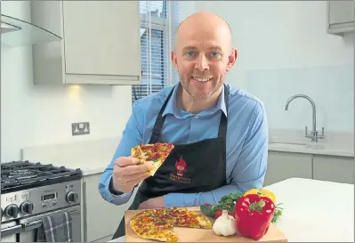  ??  ?? PRIZEWINNE­R: Glasgow chef Dave Gannon, has ambitious plans for his popular curry-flavoured pizza creations. Picture: Andy Buchanan