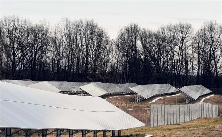  ?? Photos by Will Waldron / Times Union archive ?? The Forefront Power community solar farm, one of the largest community solar projects in upstate New York, officially opened Dec. 16, 2019, in Halfmoon