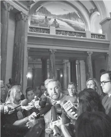  ?? MICHAEL BELL/THE CANADIAN PRESS ?? NDP Leader Tom Mulcair speaks to reporters in the Saskatchew­an Legislativ­e Building in Regina on Monday after meeting with Saskatchew­an Premier Brad Wall.