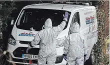 ?? FRANK AUGSTEIN THE ASSOCIATED PRESS ?? Soldiers work on a van in Winterslow, England, Monday as investigat­ions continue into the nerve-agent poisoning of a Russian ex-spy.