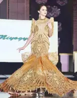  ??  ?? Bb. Niyogyugan 2017 Ashanti Ervas in a gown made from an allcoconut tree material.