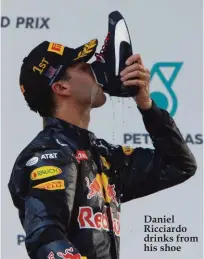  ??  ?? Daniel Ricciardo drinks from his shoe