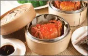  ??  ?? The steamed hairy crab served at Loong Yuen Cantonese Restaurant is a highlight of the diner’s seasonal offerings.
