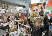  ?? ABED AL HASHLAMOUN/EPA ?? Palestinia­ns rally Wednesday against Israeli Sgt. Elor Azaria, who killed a badly wounded Palestinia­n attacker.