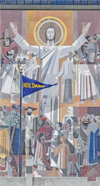  ?? MATT CASHORE/AP ?? The Touchdown Jesus mural can be an intimidati­ng sight for Notre Dame’s opponents.