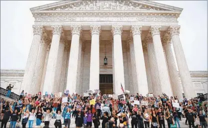  ?? Shawn Thew EPA/Shuttersto­ck ?? PROTESTS on the steps of the Supreme Court on Saturday as Brett Kavanaugh’s appointmen­t was confirmed by the Senate.