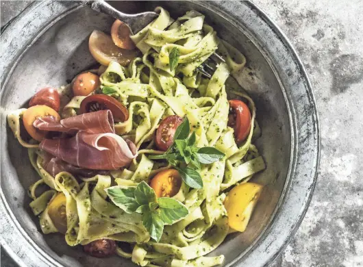  ?? JENA CARLIN PHOTOGRAPH­Y ?? Fettuccine with Triple Basil Jalapeño Pesto is a perfect summer pasta dish.