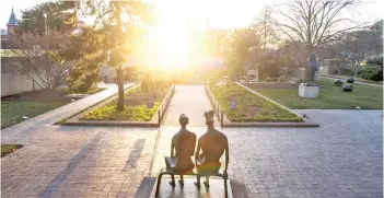  ?? — The Washington Post by Amanda Voisard Marvin Joseph ?? The Hirshhorn Museum’s sculpture garden at sunset.