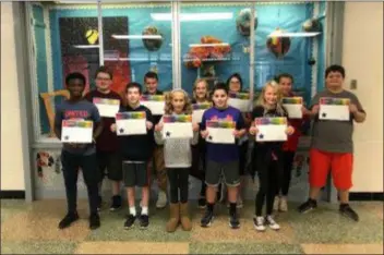  ?? SUBMITTED PHOTO ?? Paxon Hollow Middle School in the Marple Newtown School District recently honored their Students of the Month for October. The following students were chosen as “Students of the Month” for being friendly and caring: left to right, front, Briyan Aben, Matthew Dobbins, Hannah Taber, Daniel Lannon, Jaelyn Shaw, back row, Jeffrey Grace, Colin Wolk, Margaret Schwerdtfe­ger, Spiridoula Geranios, Annabella DiIanni, and Robert Eager. Nora Jakows does not appear in photo.