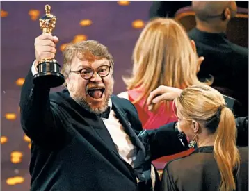  ?? CHRIS PIZZELLO/INVISION ?? Guillermo del Toro won the award for best director Sunday, and his film, “The Shape of Water,” also took the top honor.