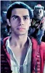  ??  ?? Aladdin (Mena Massoud) with his pet monkey Abu