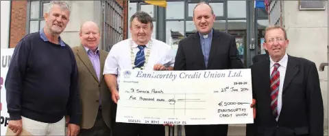  ??  ?? Jimmy Gahan, fund raising committee; Tony Ennis. Enniscorth­y Credit Union manager; Pat O’Shea, Enniscorth­y Credit Union board of directors chairman; Fr. John Byrne, St. Senan’s parish and Billy Byrne St Senan’s fiance committee.