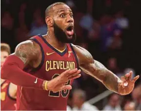  ?? AFP PIC ?? Cavaliers’ LeBron James urges his teammates in the final minute of the game against the Knicks in New York on Monday.