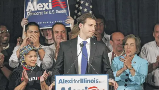  ?? BRIAN KERSEY/GETTY IMAGES ?? Alexi Giannoulia­s makes his concession speech after losing the race for U.S. Senate to Republican Mark Kirk in 2010.