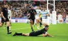  ?? Adam Pretty/World Rugby/Getty Images ?? Will Jordan slides in for New Zealand’s first try against Argentina. Photograph: