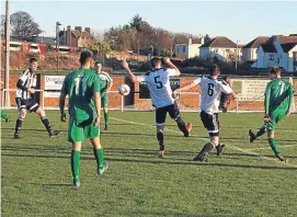  ?? Picture: John Laing. ?? Shaun Keatings fires Thornton Hibs ahead in their clash with Dunbar United.