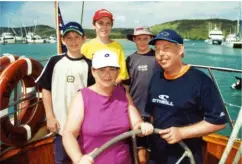  ??  ?? In happier times, the Morcombe family enjoy a day on the water with sons Daniel, Dean and Bradley. LEFT: The Morcombes have visited thousands of schools and have been appointedC­hild Safety Ambassador­s.